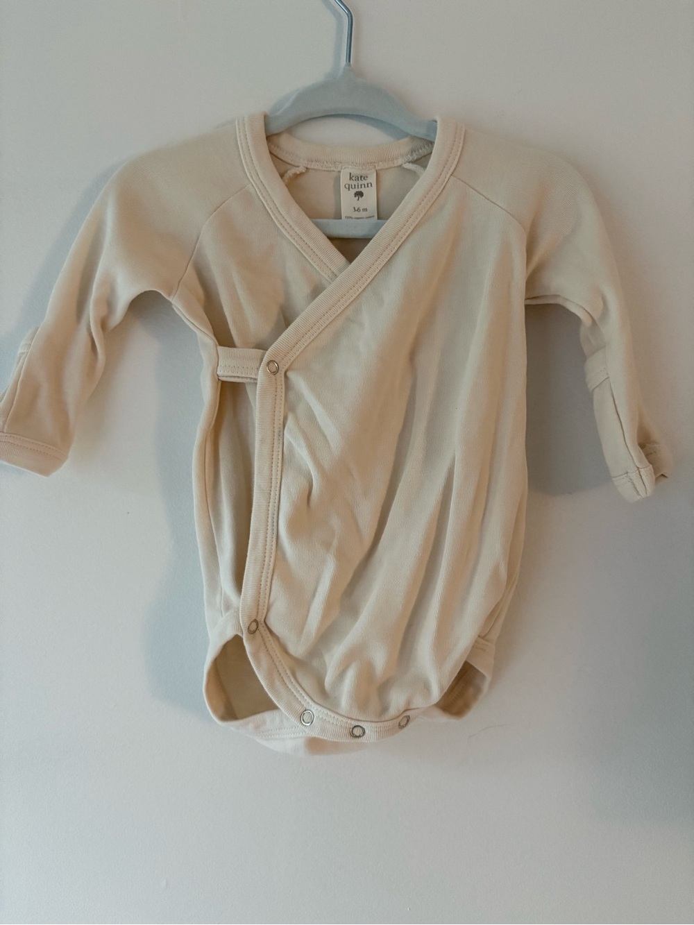 Kate Quinn Cream Wrap One-Piece Bodysuit